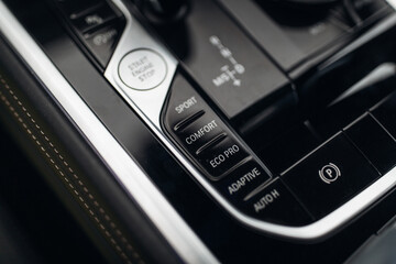 Modern car driving mode control panel with sport and comfort buttons