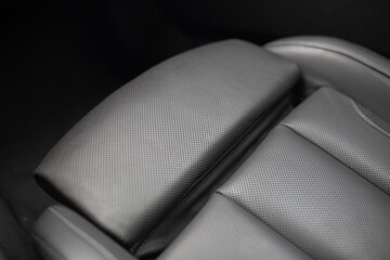 Close up view of modern car leather seat at the luxury interior
