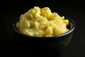 Soft and indulgent dish of mashed potatoes with crispy butter and thyme