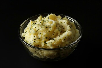Warm and cozy side dish of mashed potatoes with melted butter and chives