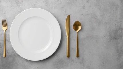 Elegant White Plate With Gold Fork and Knife on Luxurious Marble Table
