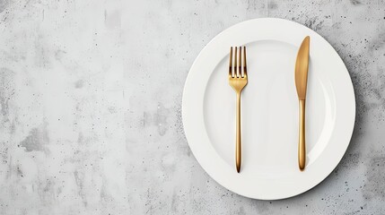 Elegant White Plate With Gold Fork and Knife on Luxurious Marble Table