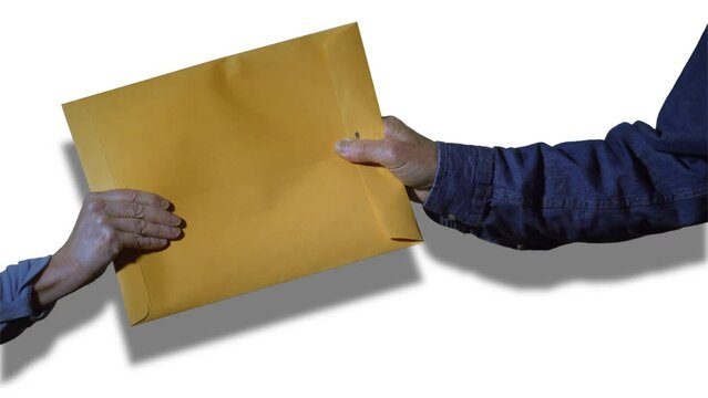 Two people handling a business manila envelope close up