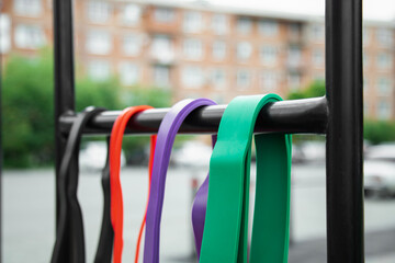  set of colorful elastic fitness bands . fitness trend for home workouts. Close up view