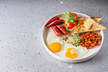 delicious traditional english breakfast on a white plate