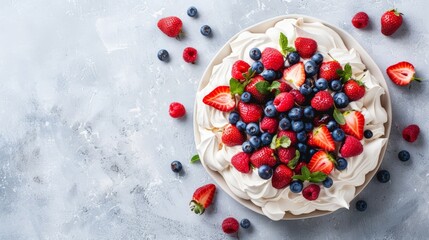 Top view of Australian pavlova with berries, using the rule of thirds, with ample copy space