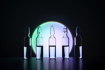 Several ampoules for injection with medicines on a blue background.