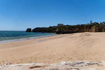 Praia da Batata beach of Ponta da Piedade in the Algarve, Portugal. Natural features, cliffs and...