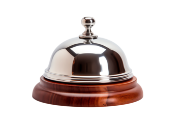 The image shows a silver bell on a wooden base