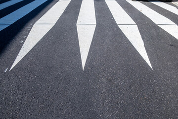 raised crosswalk painted on the asphalt