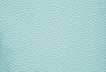 Cyan color bubbled metal sheet abstract pattern.