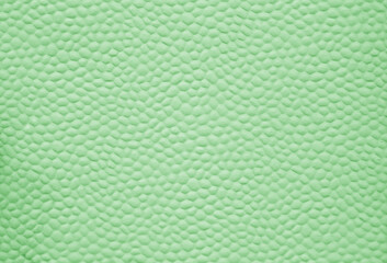 Green color bubbled metal sheet abstract pattern.
