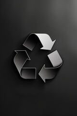 Symbole de recyclage brillant sur fond noir