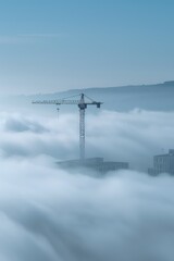 construction crane on the blue clouds