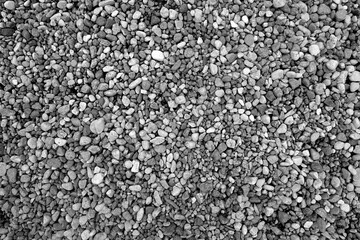 Pile of gray color decorative pebblestones as background.