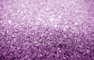 Cork advertising pin board texture close up with blur effect in violet color.