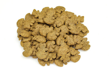 Pile of dry crunchy pet dog food isolated on white background