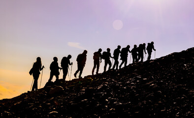 Crowd climber activity,traditional hiking concept and silhouette of climbers