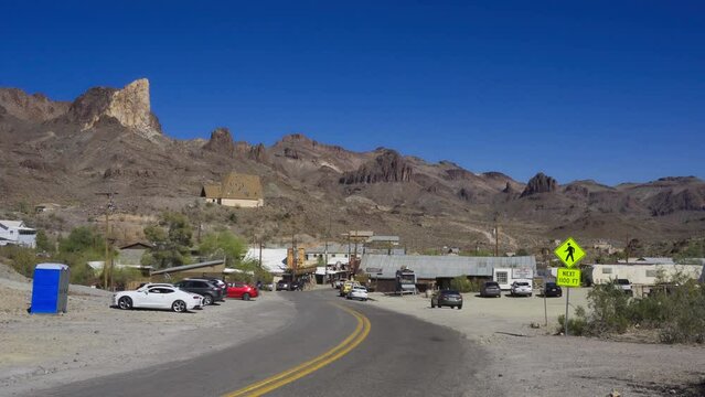 Pan right of Oatman on the historic Route 66. This former mining town is situated in the Black Mountains of Mohave County in Arizona. 4K UHD video.