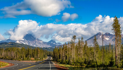 Three Sisters and Broken Top Mountains from Cascade Lakes Highway, Oregon © Stephen