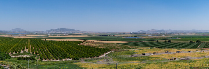 Naklejka premium The panoramic view from Tel Megiddo Nation Park of the Jezreel Valley in northern Israel. 