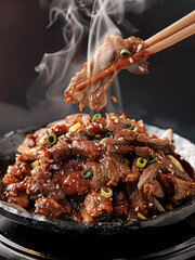 Bulgogi beef bowl ground beef. Korean food bulgogi bbq steak grilled menu close up. Asian stir fry beef. chinese beef stir fry recipe. 
Korean bulgogi beef stir fry with chopsticks. 