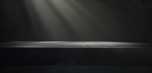 A dark grey table with soft light shining from the right side, set against an allblack background Generative AI