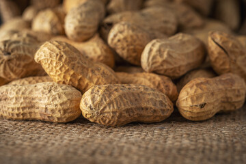 Close-up view of peanut in sack bag. Food background.