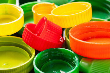 Plastic lids. Colored plastic caps. Recycling of plastic
