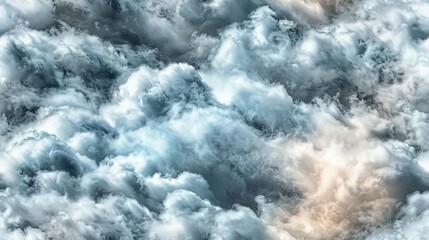 Obraz premium Large clouds visible in aerial view of plane flying in the sky above them