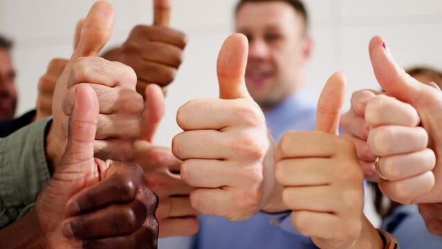 People's Hand Showing Thumb Up Sign