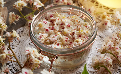 Making herbal tincture from horse chestnuts flower