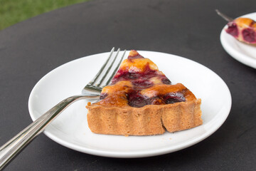 Pie shortcrust pastry with cherry filling. Closeup