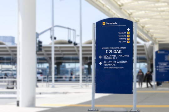 Oakland,California, USA: May 1 ,2024: Navigating to Terminal. A heated debate is underway regarding a name change for Oakland International Airport.