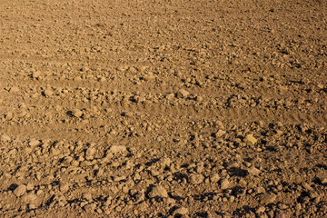 Farm land after plowing with a tractor for planting crops