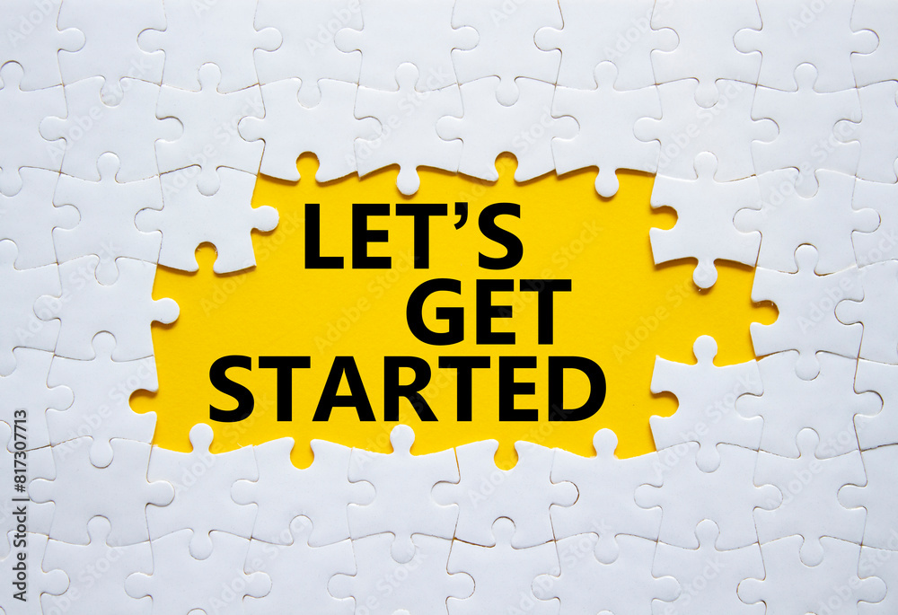 Canvas Prints lets get started symbol. concept words lets get started on white puzzle. beautiful yellow background