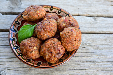 Home made Fried  pork meatballs  outdoor on wooden rustic background