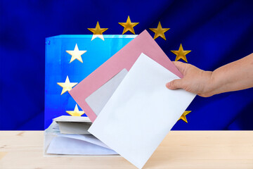 European election, female hand voter with ballot paper, transparent ballot box, political parties,...