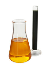 Test tube and flask with different types of oil isolated on white