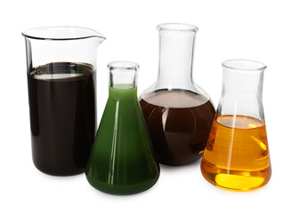 Beaker and flasks with different types of oil isolated on white