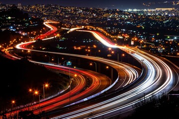 The image shows active highways at night with light trails from vehicles, highlighting the dynamic nature of city life