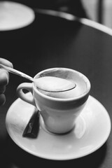 Cute Cup of Coffee with a Cookie in a Cafe in Paris, France