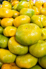 lemons in the market, mandarina,tangerine.