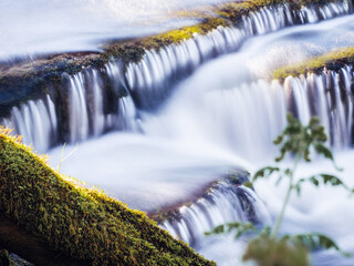 Stunning nature scene at Fowley's fall. Waterfall with blurred water. Nature background. Travel and...