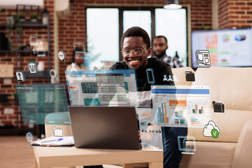 Business man analyzing financial data using AI interface for work tasks optimization on laptop, planning timetable with smart things system. Manager does research with database software access.