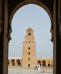 Obraz premium Patio of Great Mosque of Kairouan with horseshoe arches and multiple columns, Tunisia
