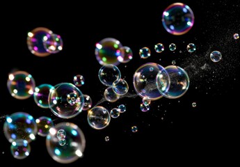 Naklejka premium A bunch of iridescent soap bubbles flying through the air against a black background Generative AI
