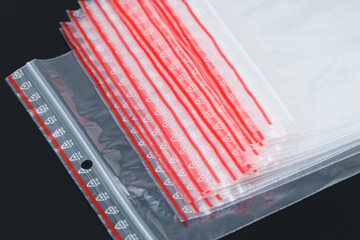 Lots of small disposable plastic ziplock bags.