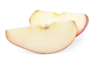 Slices of ripe red apple isolated on white
