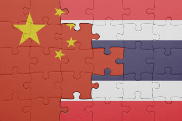 puzzle with the colourful national flag of thailand and flag of china .
